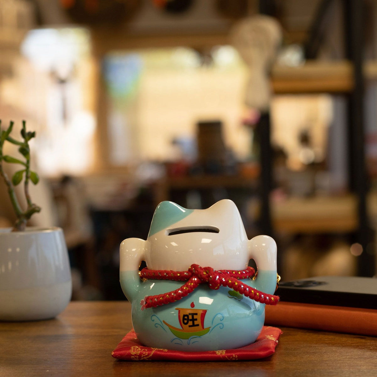 Japanese Lucky Cat Ceramic Money Box on Cushion – Blue