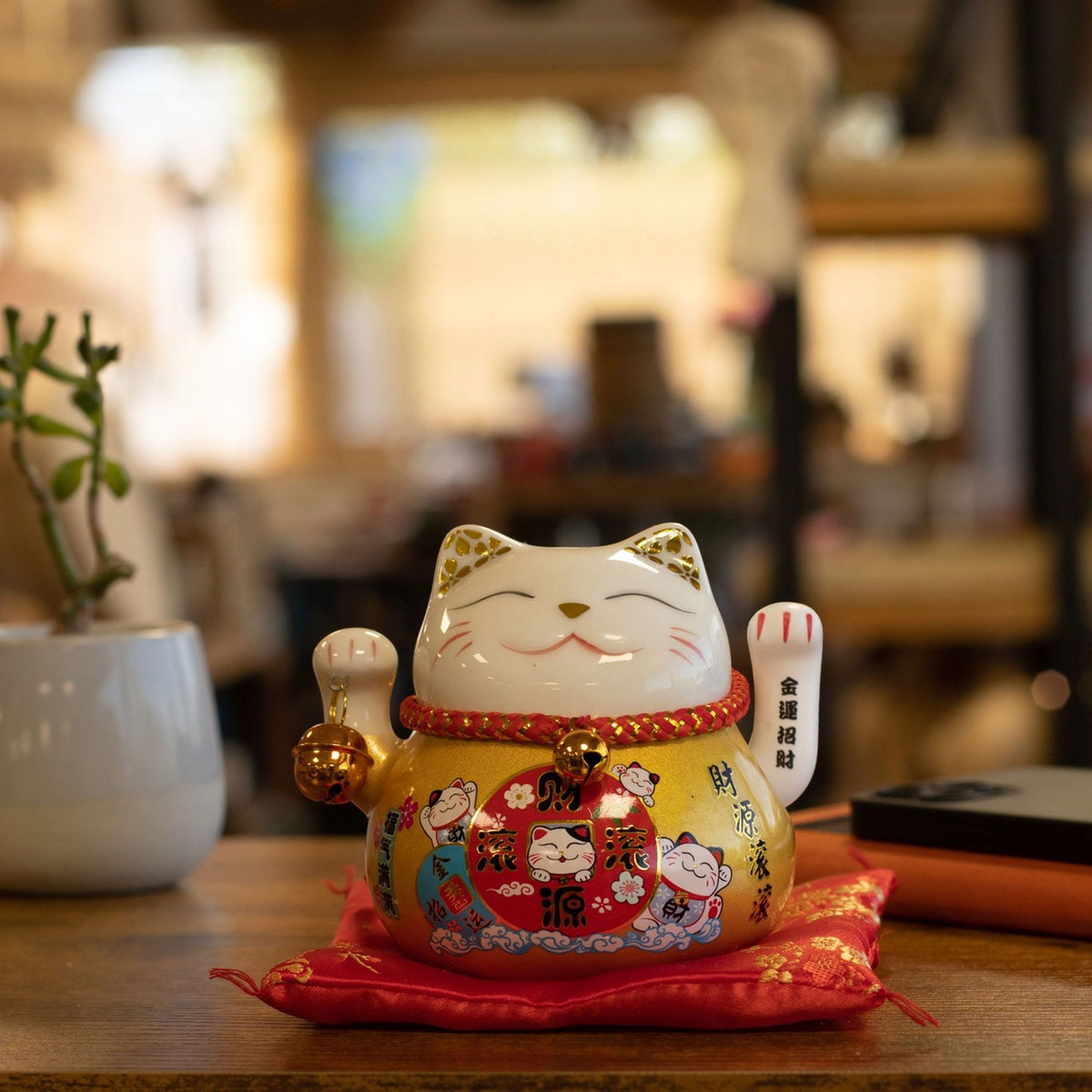 Japanese Lucky Cat Ceramic Waving Ornament on Cushion – Gold