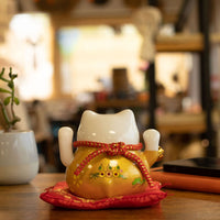 Japanese Lucky Cat Ceramic Waving Ornament on Cushion – Gold