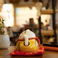 Japanese Lucky Cat Ceramic Waving Ornament on Cushion – Gold