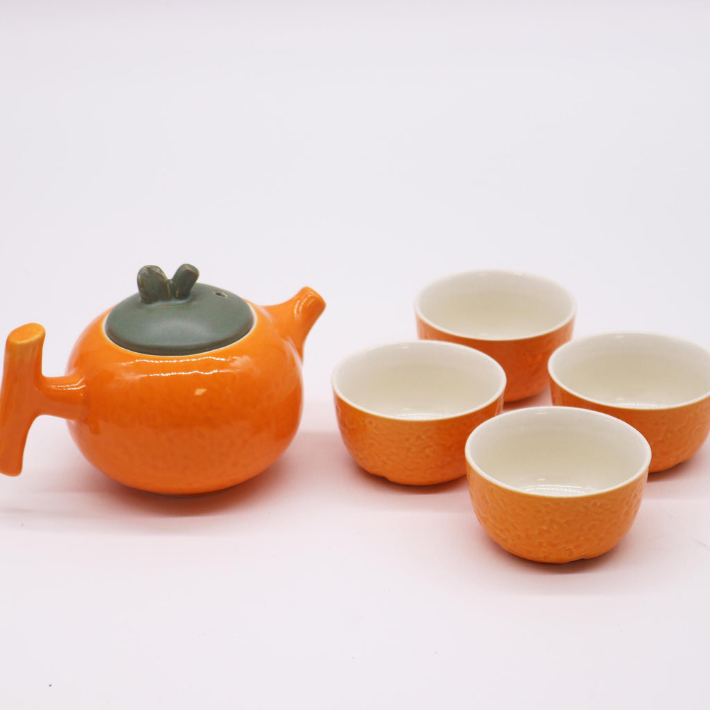 Herbal Orange Teapot Set with Four Matching Cups for Tea Lovers