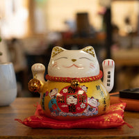 Japanese Lucky Cat Ceramic Waving Ornament on Cushion – Gold