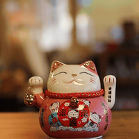 Japanese Lucky Cat Ceramic Waving Ornament on Cushion – Pink