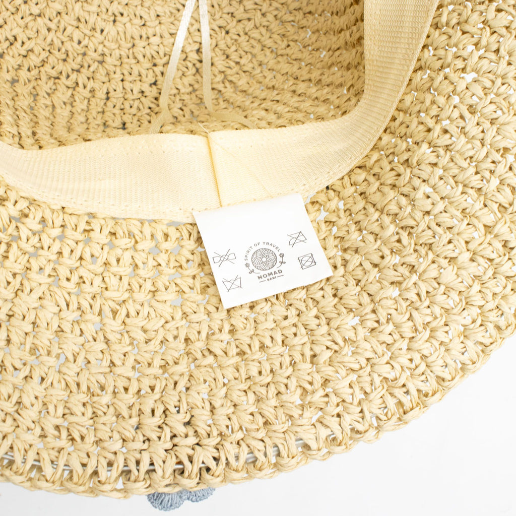Nomad Sari Floppy Straw Sun Hat Beige with Blue Floral Accents
