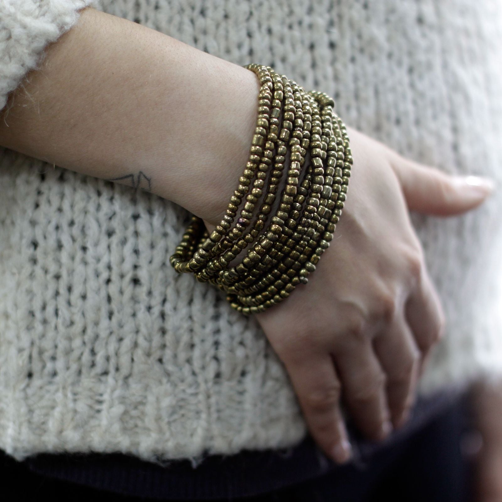 Multi Bead Bangle with Wooden Clasp in Assorted Gold and Bronze