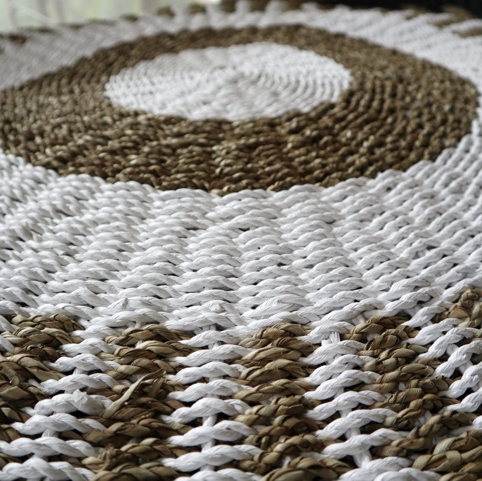 Round Seagrass White and Tan Rug with Stylish Sun Design