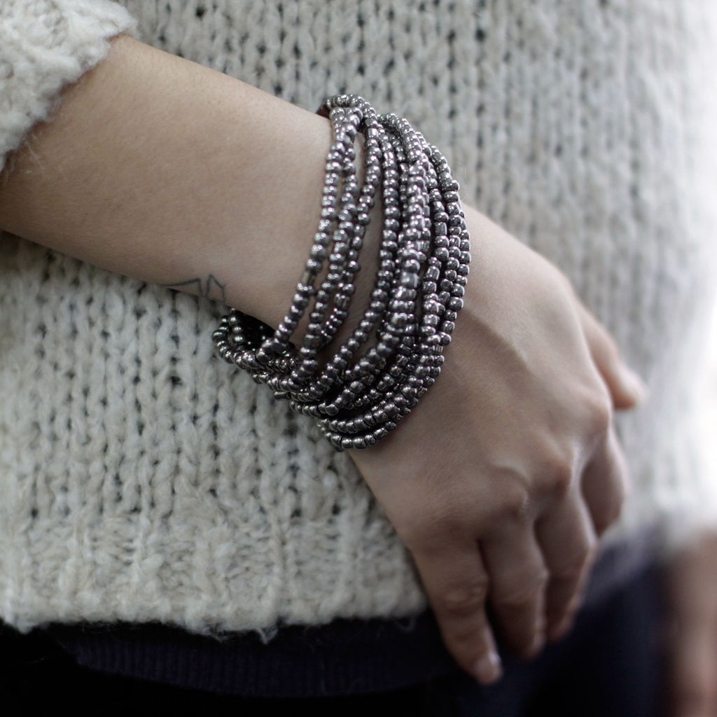Multi Bead Bangle with Wooden Clasp in Assorted Gold and Bronze