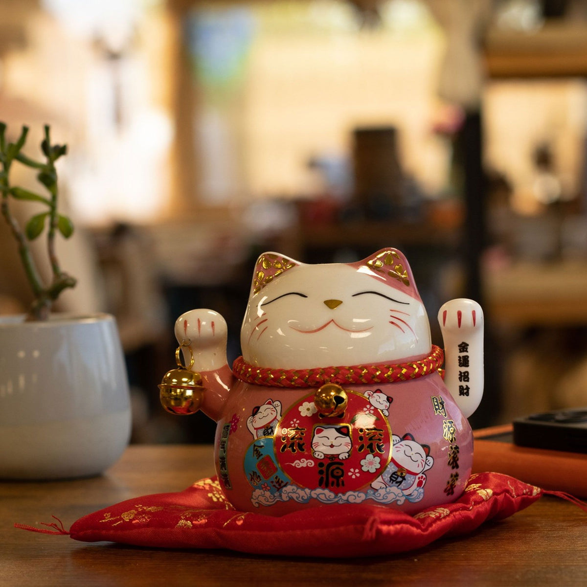 Japanese Lucky Cat Ceramic Waving Ornament on Cushion – Pink