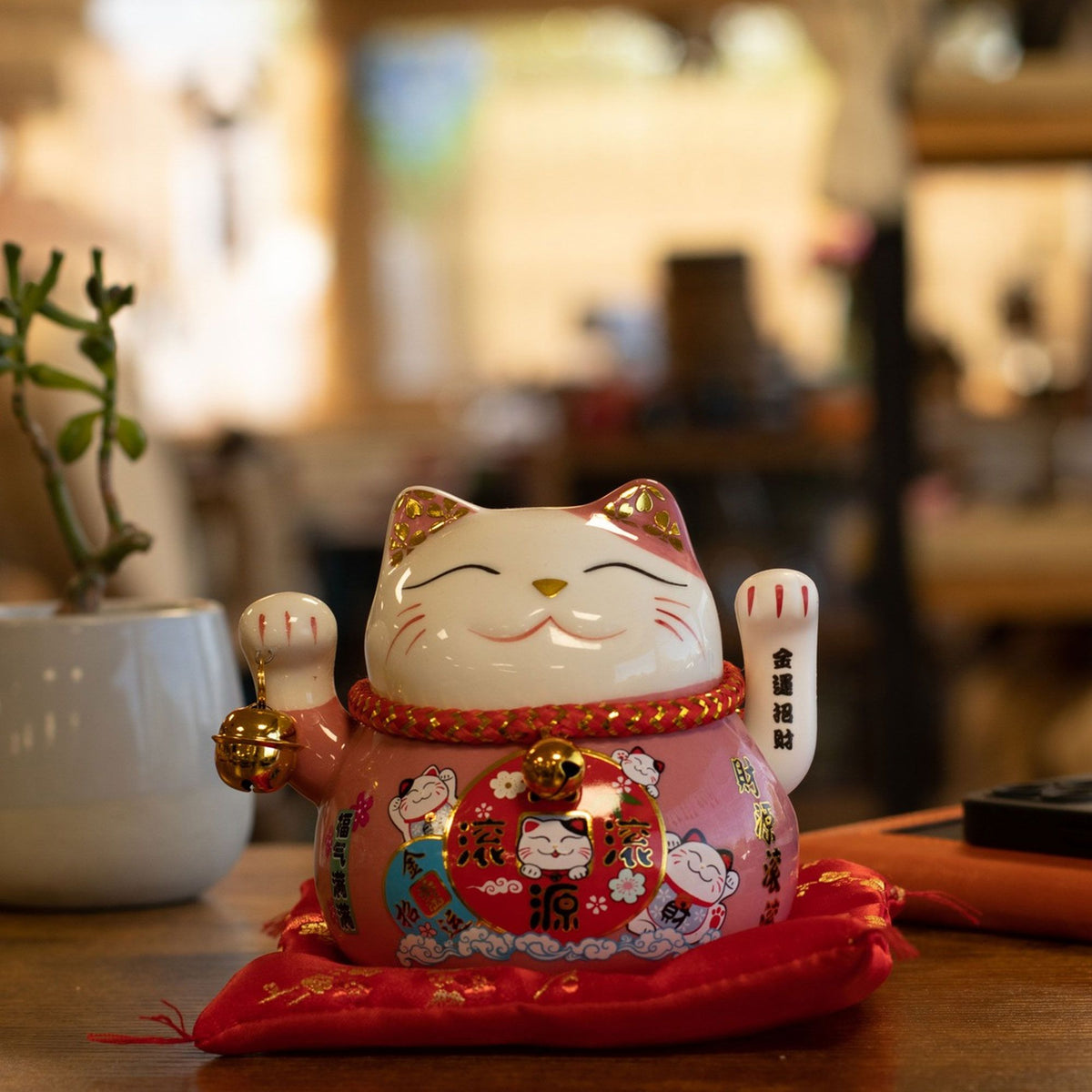 Japanese Lucky Cat Ceramic Waving Ornament on Cushion – Pink