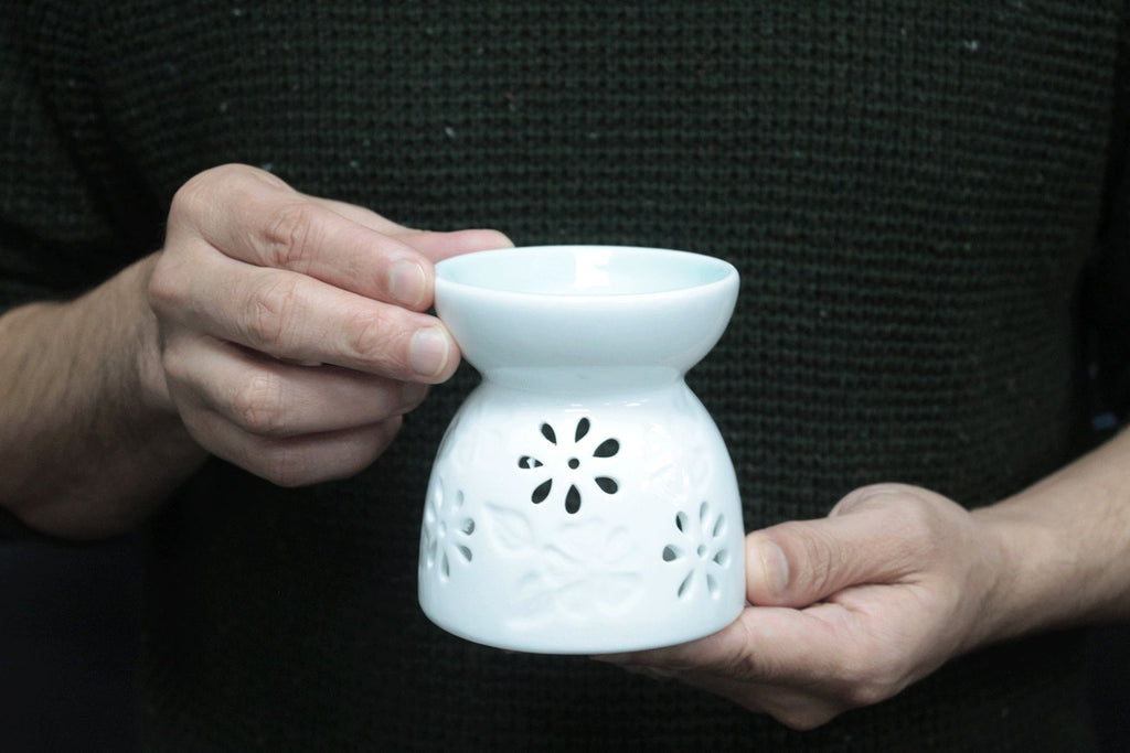 Classic White Oil Burner with Floral Design and Teal Well Feature