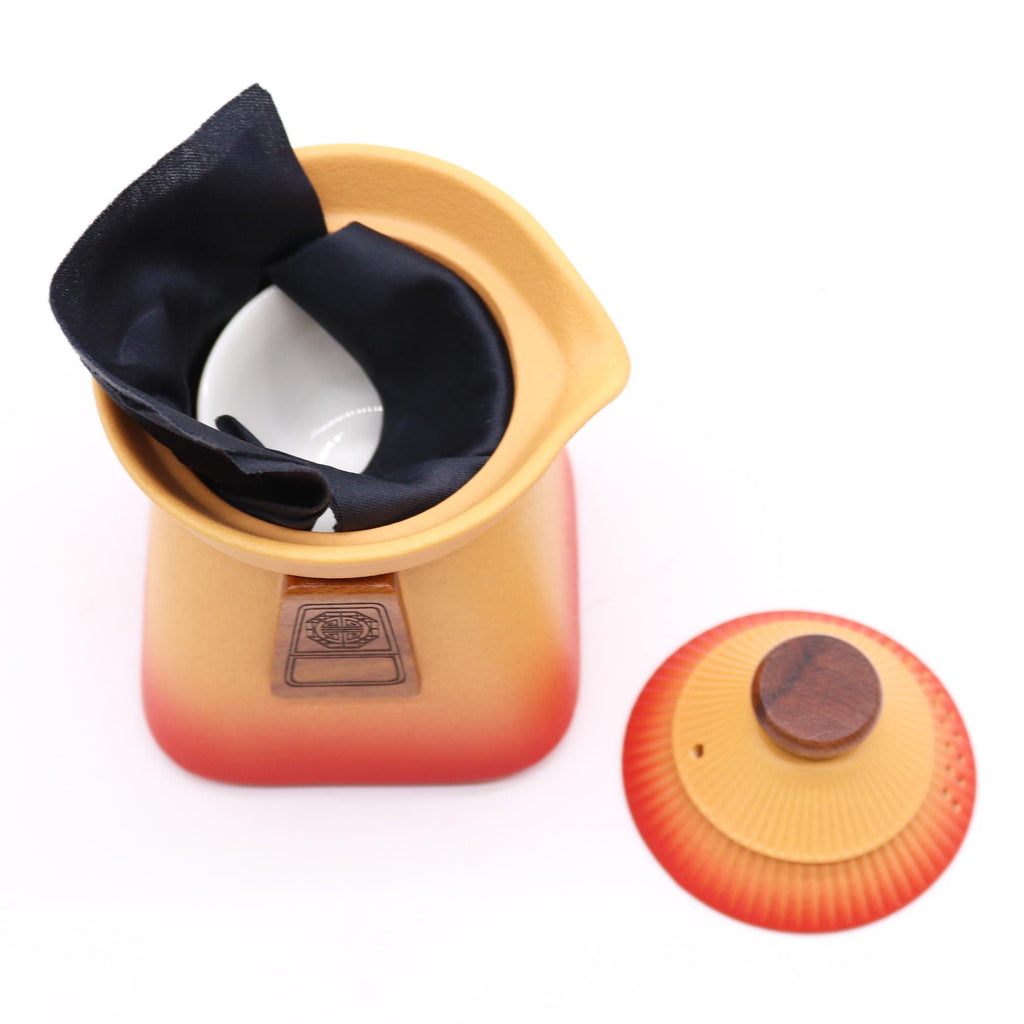 Temple Teapot Set with Three Cups in Vibrant Orange Earth Tones