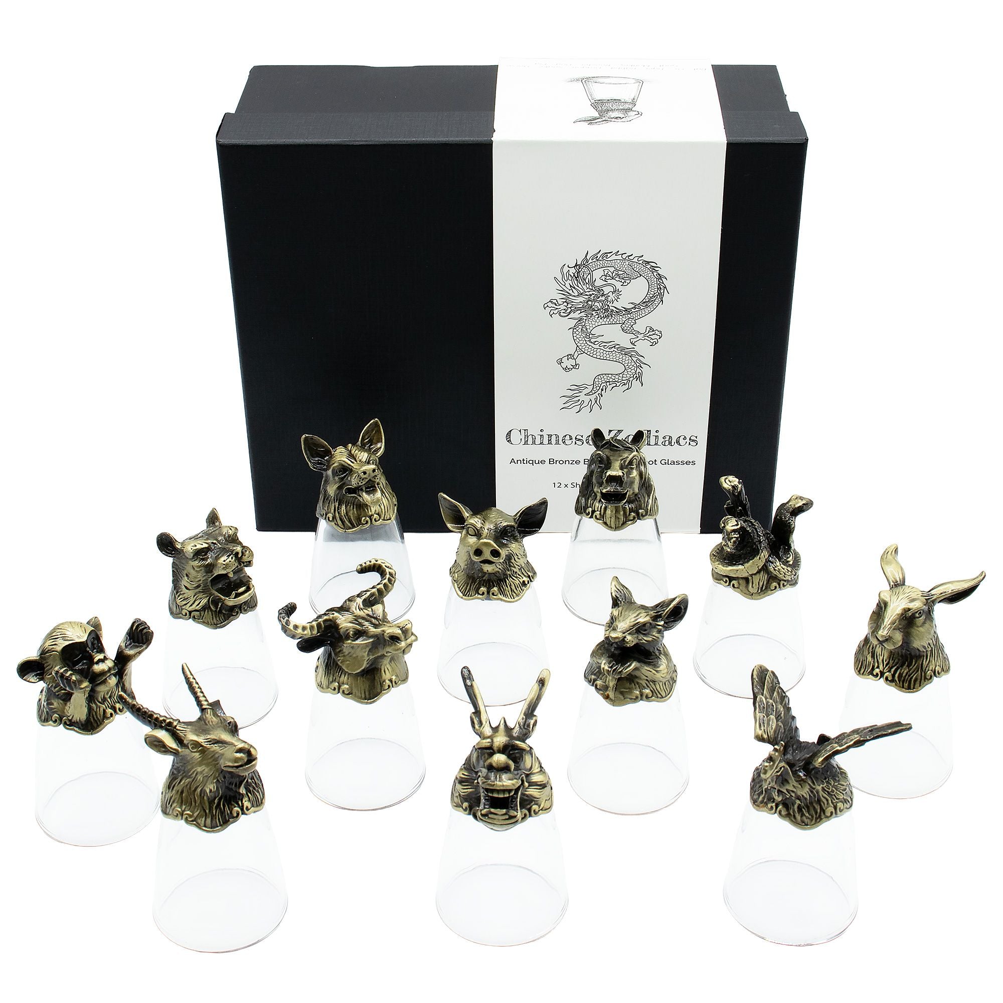 Set of twelve bronze animal head sculptures on clear stands with a branded box in the background.