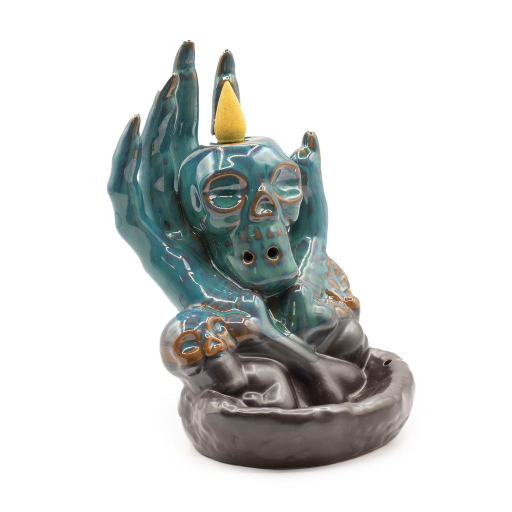Skull in Hand Backflow Incense Burner for Dramatic Home Décor