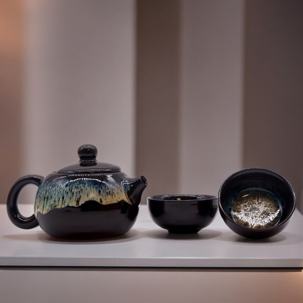 Herbal Black Glaze Teapot Set with Two Elegant Matching Cups