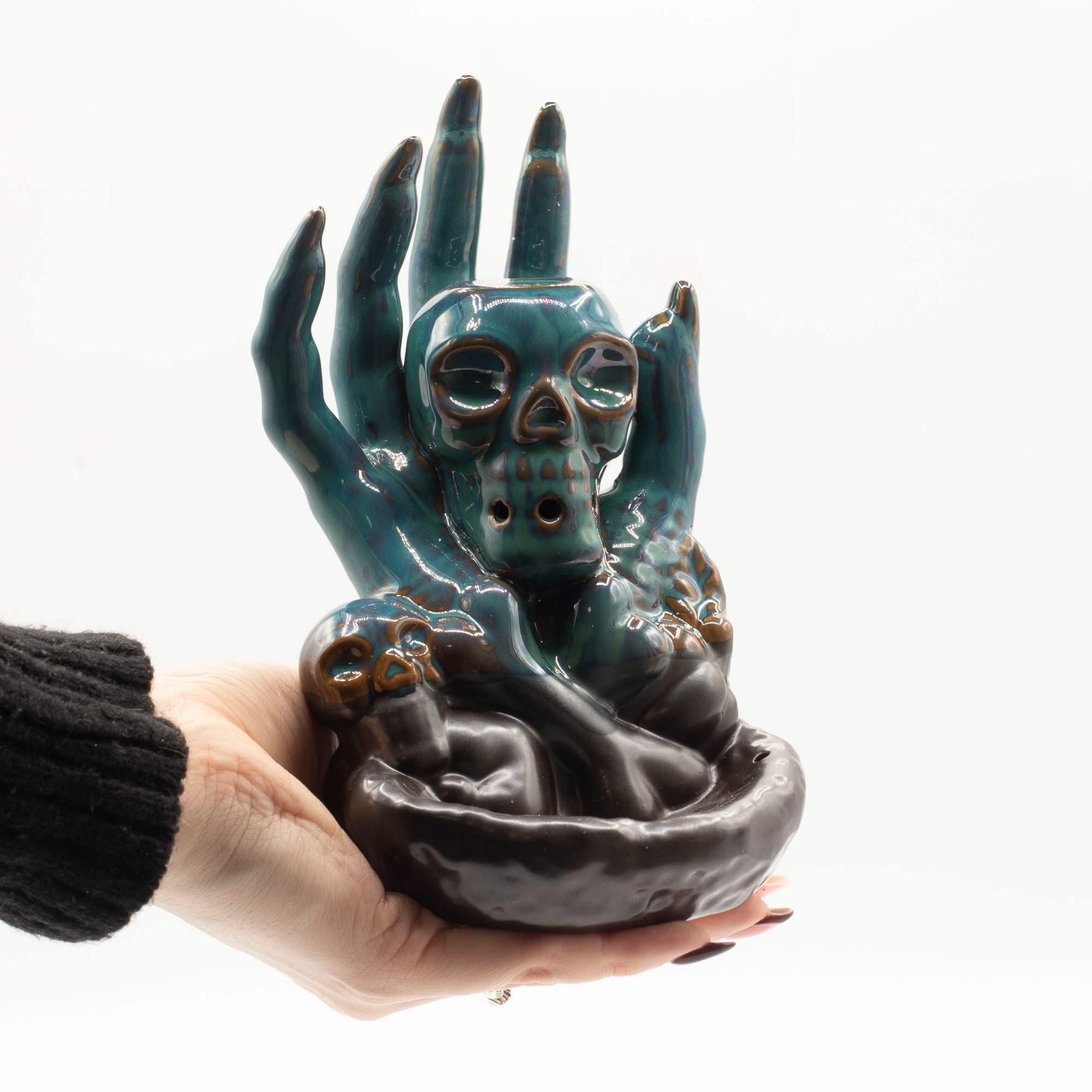 Skull in Hand Backflow Incense Burner for Dramatic Home Décor