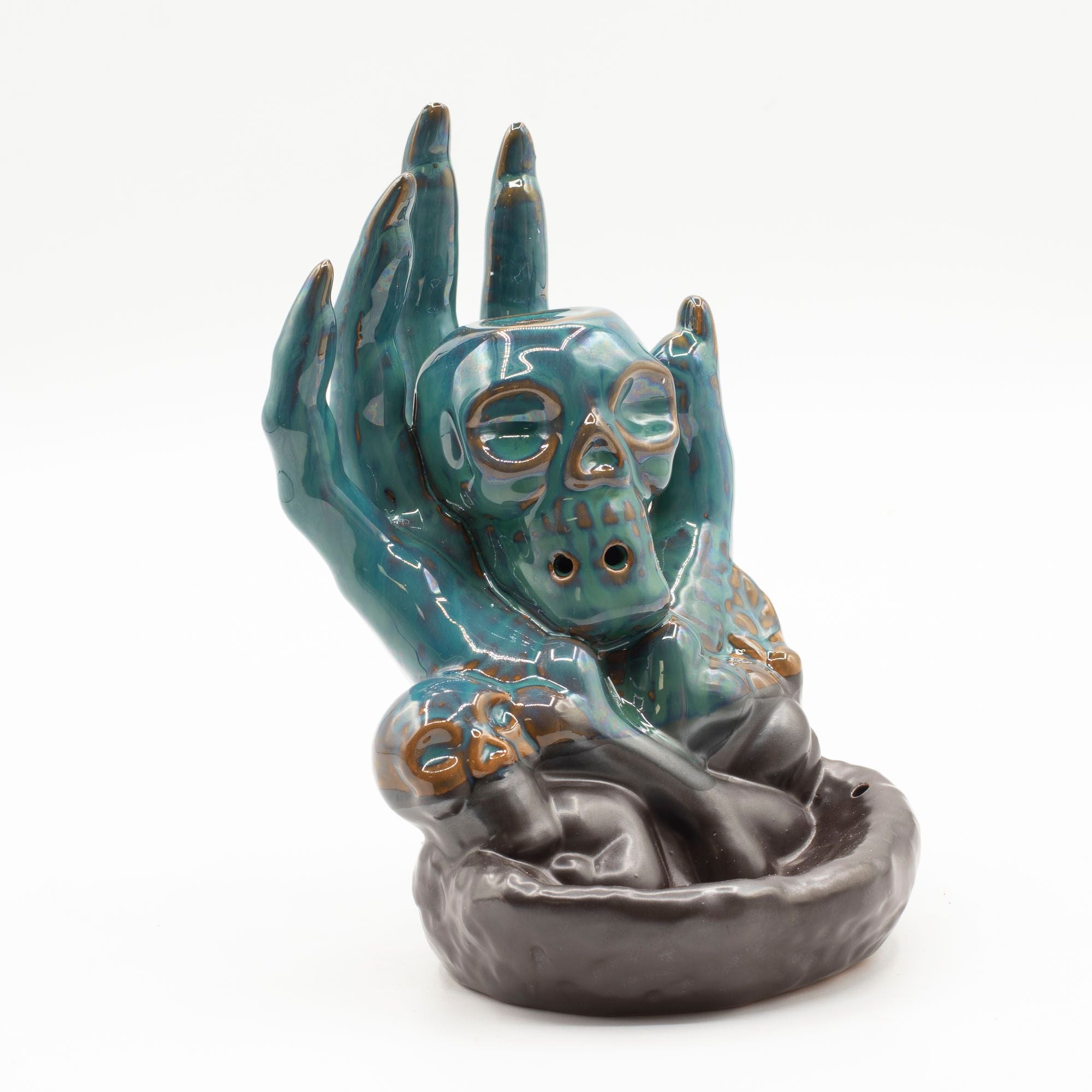 Skull in Hand Backflow Incense Burner for Dramatic Home Décor