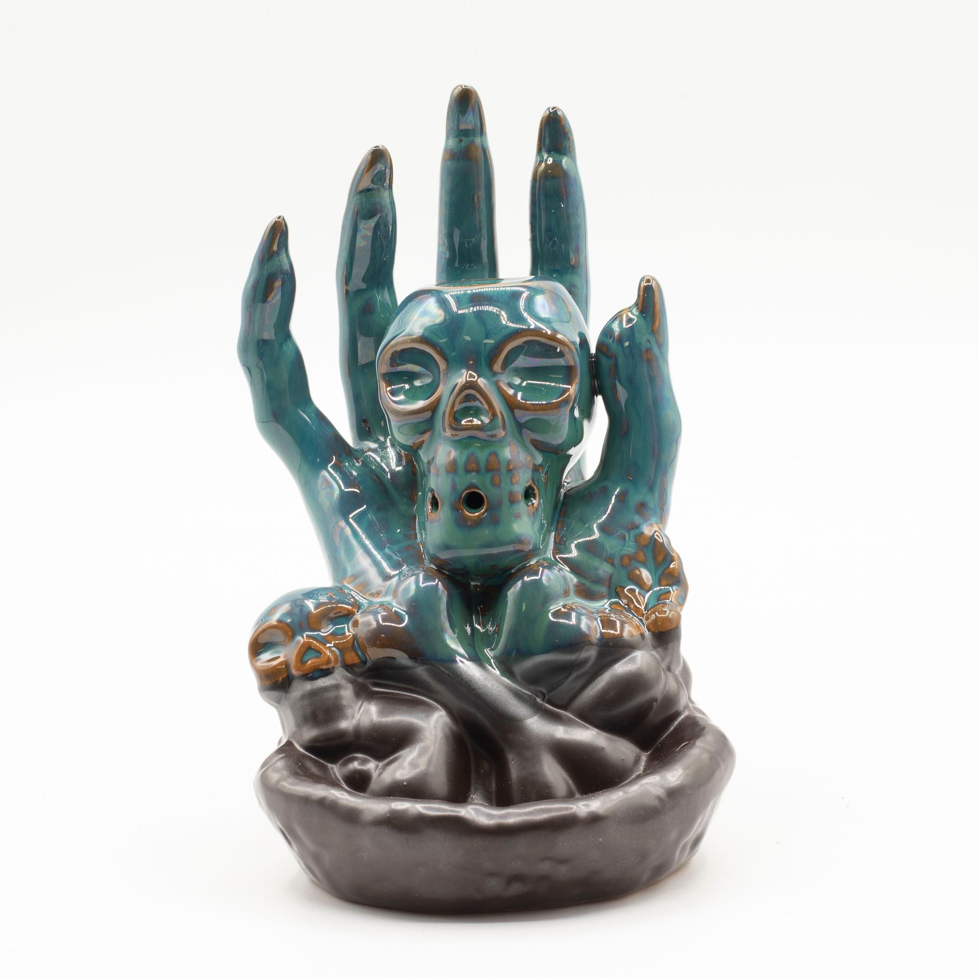 Skull in Hand Backflow Incense Burner for Dramatic Home Décor