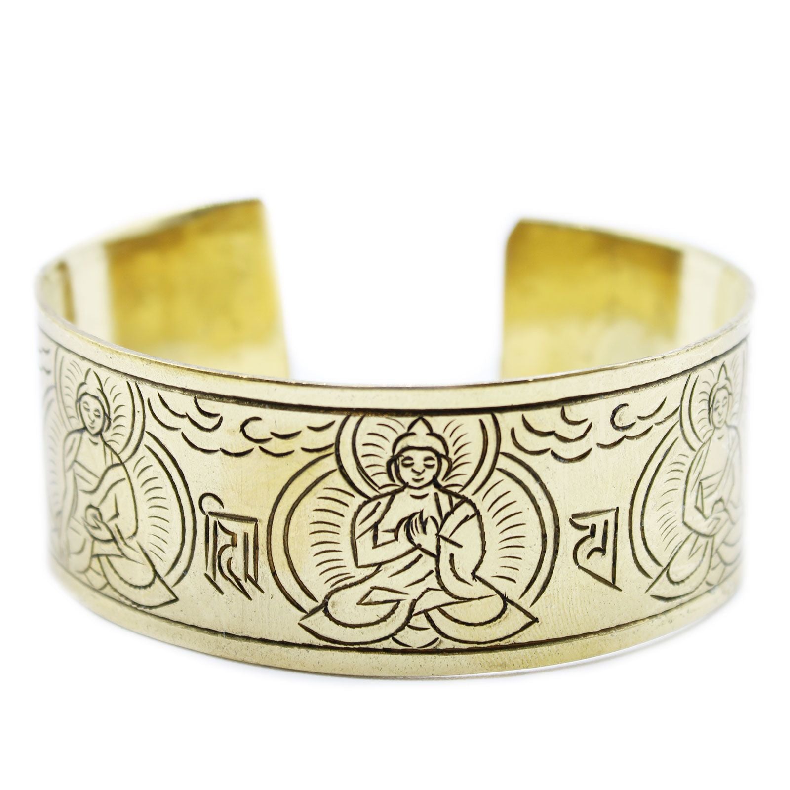 Gold bracelet with engraved designs on a white background