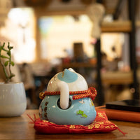 Japanese Lucky Cat Ceramic Waving Ornament on Cushion – Blue