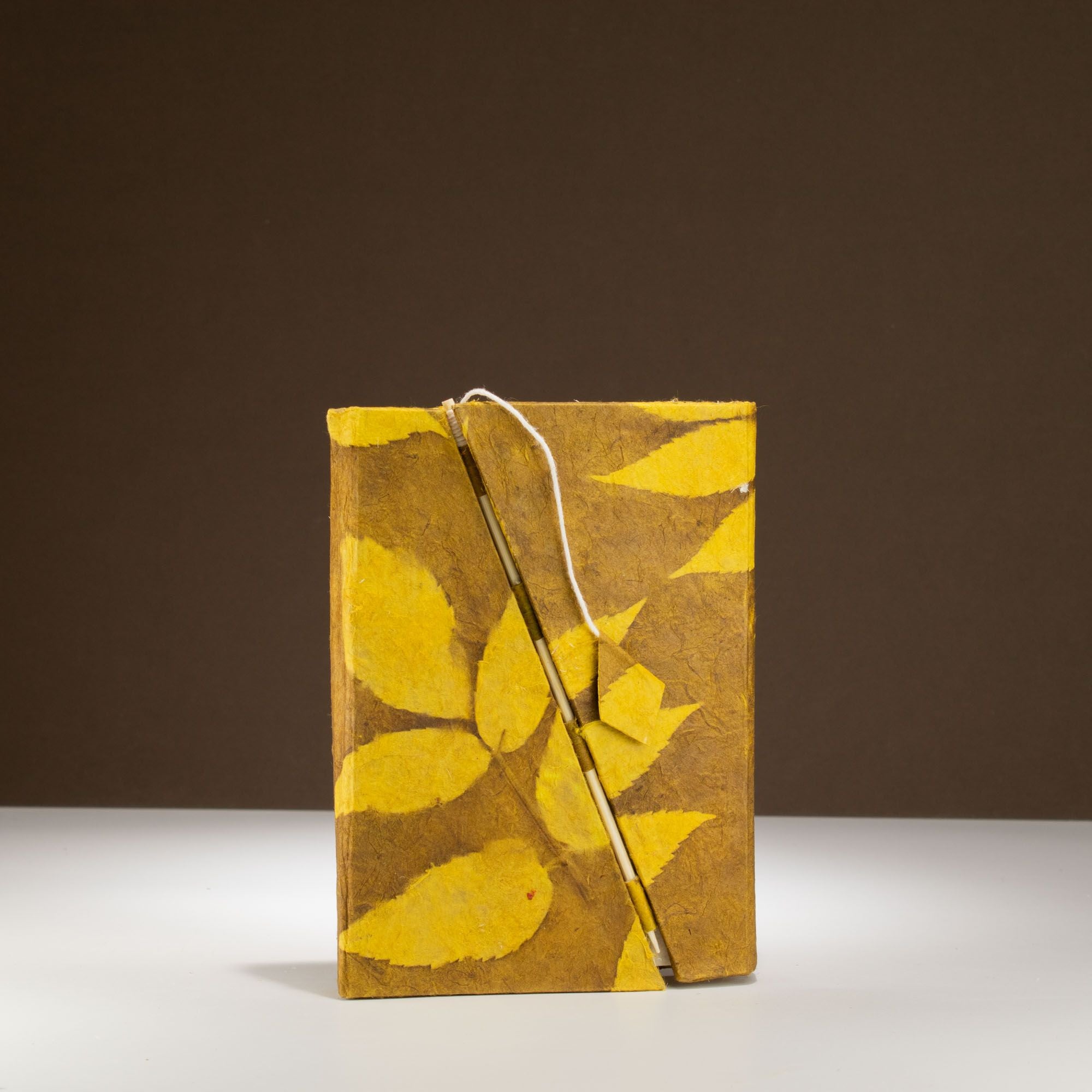 Lokta Bold Floral Bamboo Lock Notebook in Mustard Brown Design