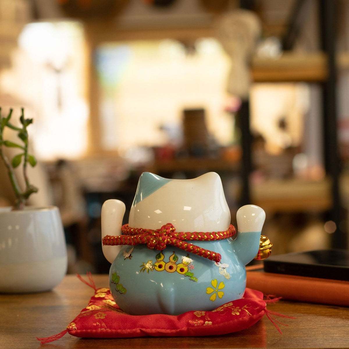 Japanese Lucky Cat Ceramic Waving Ornament on Cushion – Blue