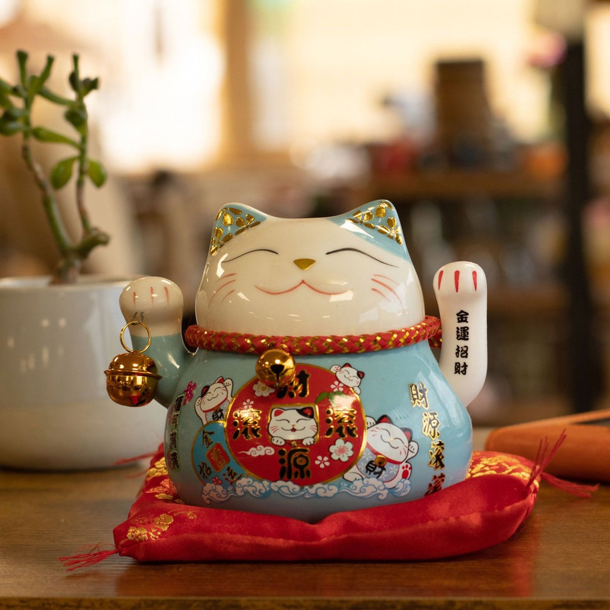 Japanese Lucky Cat Ceramic Waving Ornament on Cushion – Blue