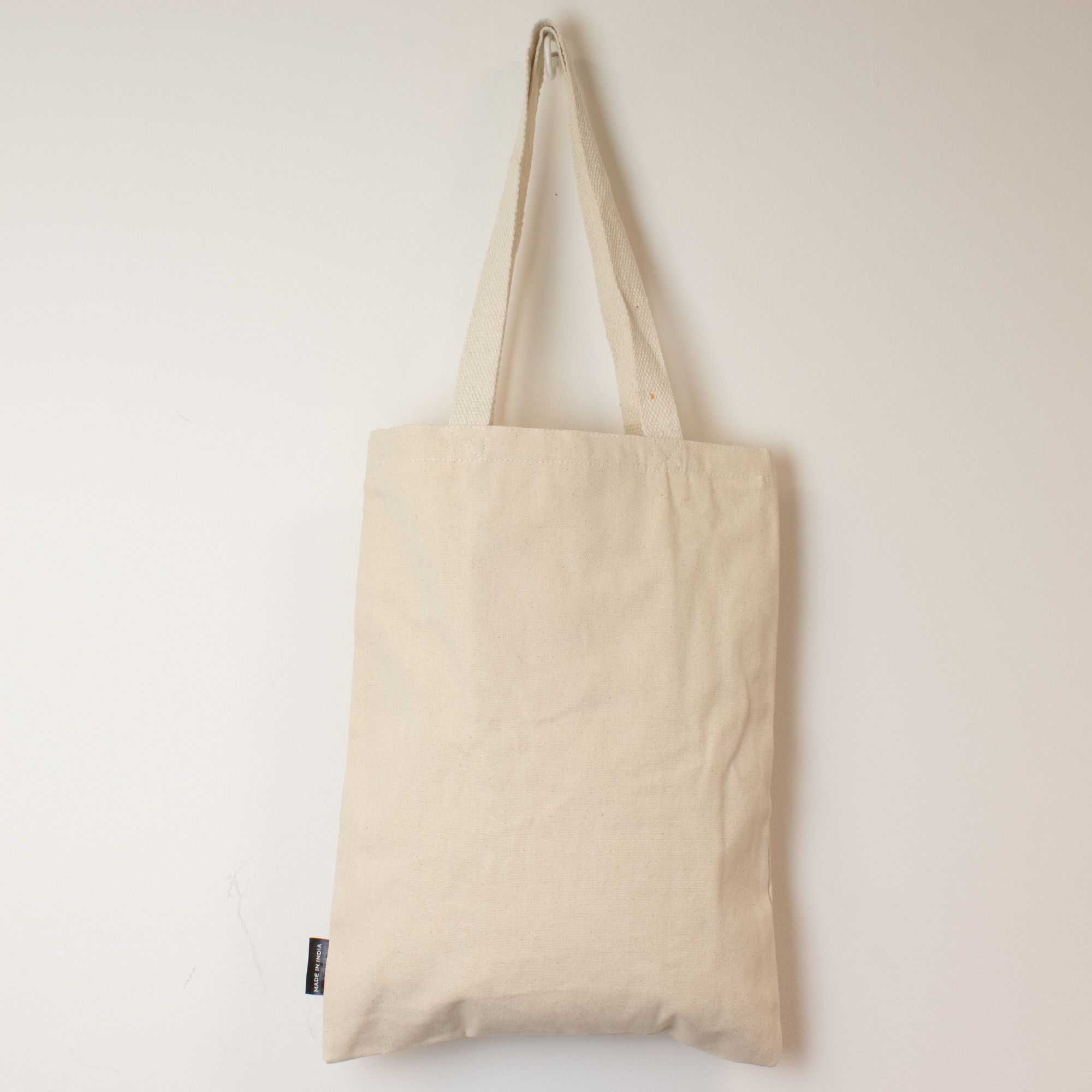 Nomad Sari Iconic Toni Tote Bag with Bee Kind Natural Design