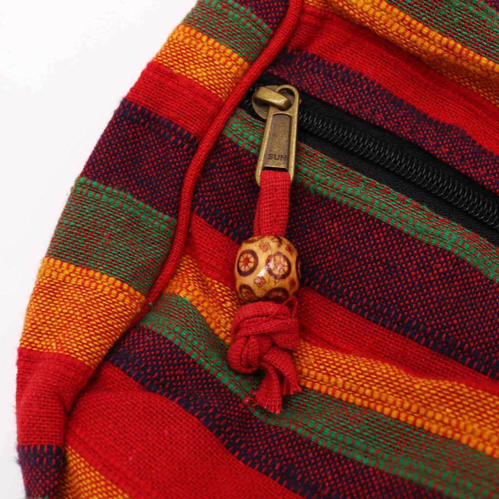 Lrg Nepal Sling Bag in Sunset Reds with Adjustable Strap Design