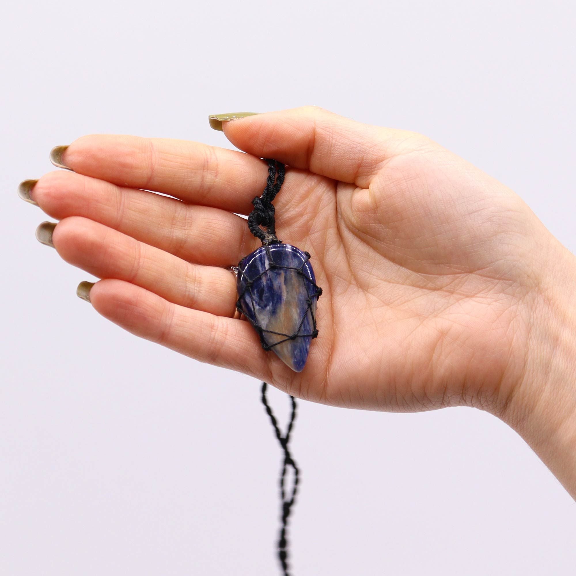 Laced Gemstone Teardrop Pendant with Stunning Sodalite Design