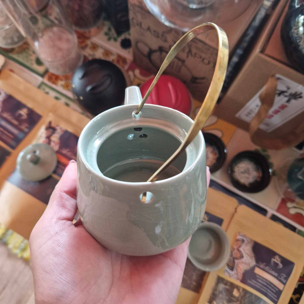 Herbal Jade Teapot Set with Elegant Design and Two Cups
