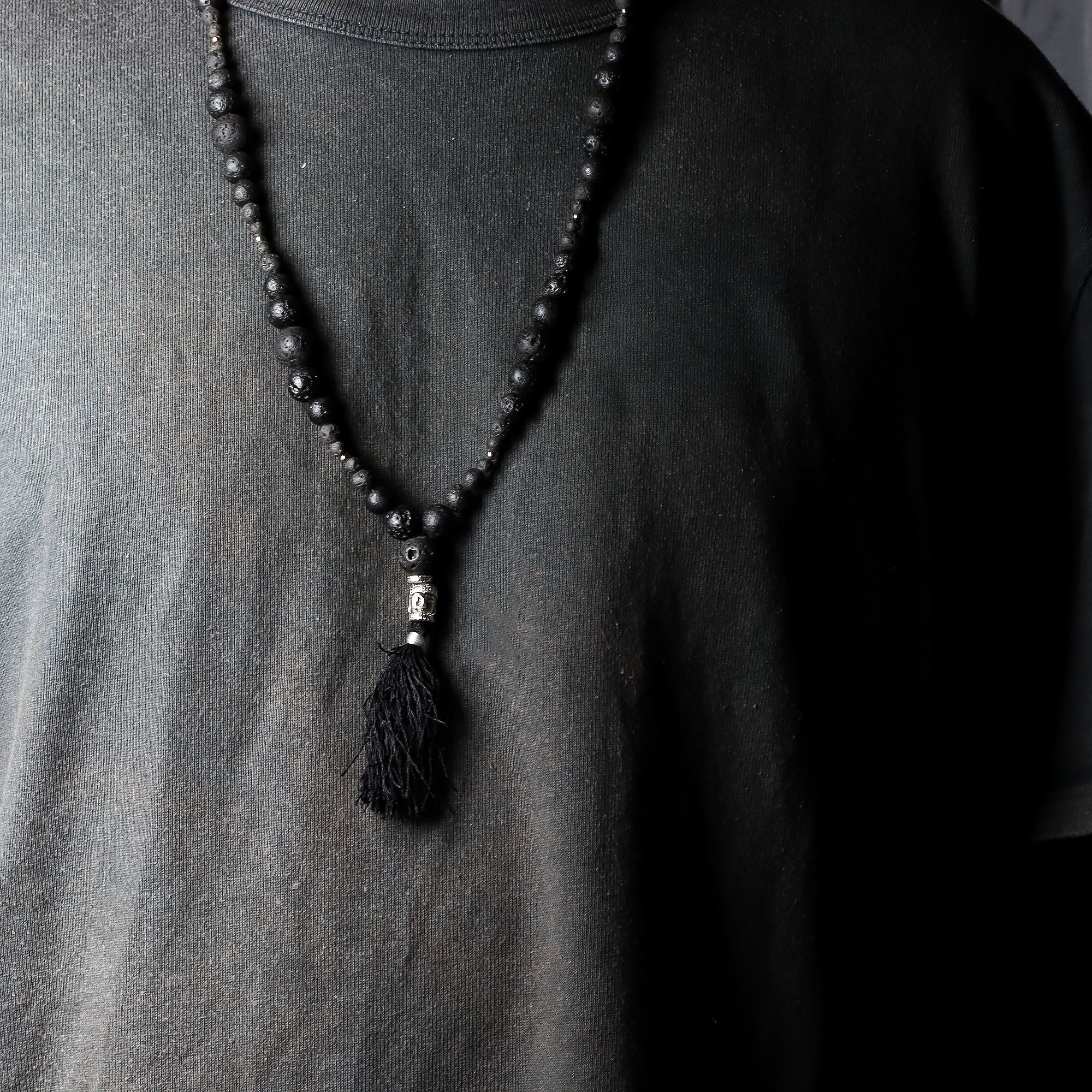 Essence of the Volcano Necklace with Silver Buddha Charm Design